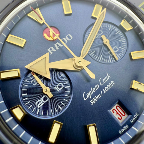 Rado Captain Cook Automatic Chronograph Ref. R32146208 | Full-Set 2026 | Unworn | NEW | Bronze | 43mm | Blue Dial | Top
